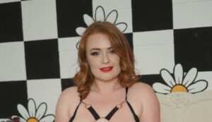 Zara Nevada poses with her tits out