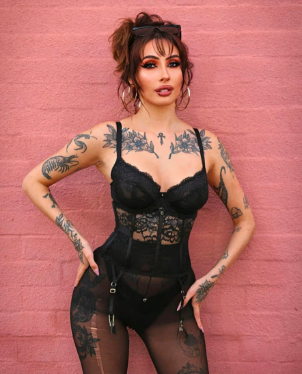 Zeena Valvona black sheer outfit